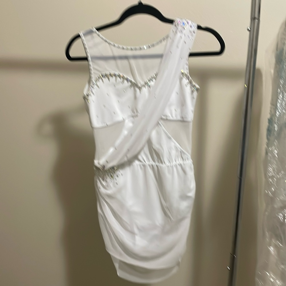 White dance leotard with custom rhinestones.  Size AM.
